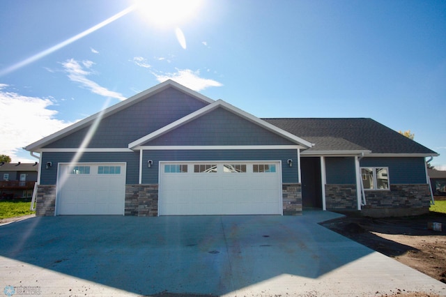 craftsman inspired home featuring a garage