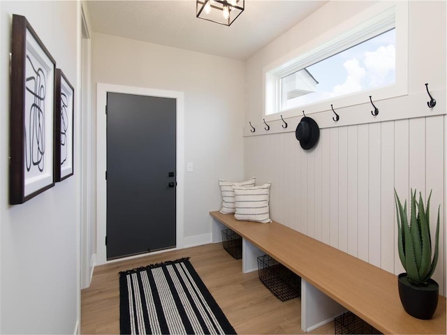 mudroom with light hardwood / wood-style flooring