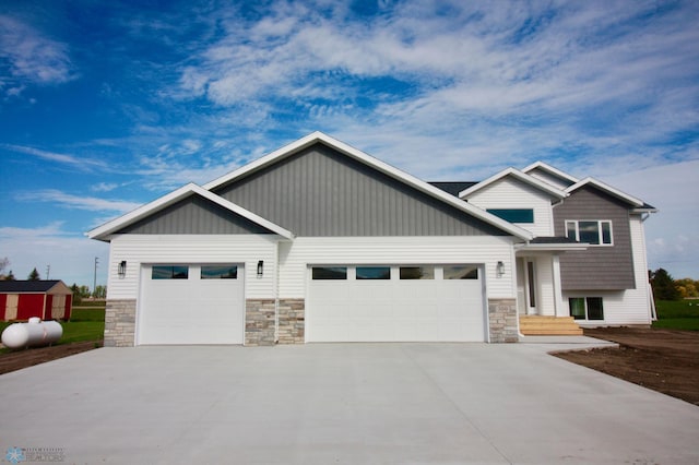 craftsman house with a garage