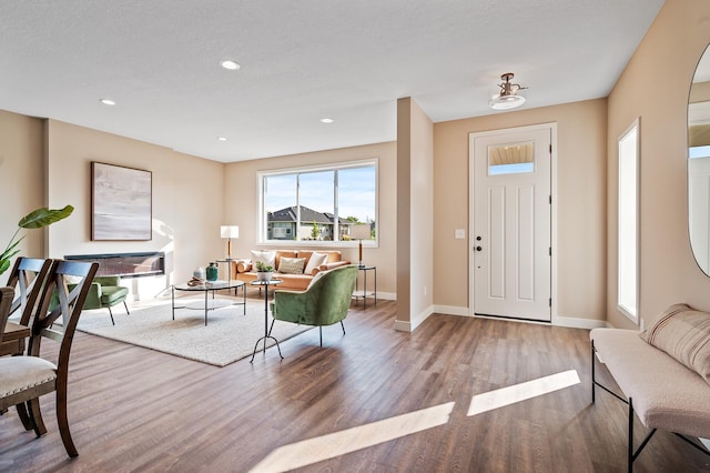 foyer with light hardwood / wood-style floors