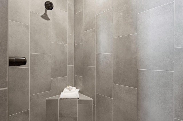 details featuring a tile shower