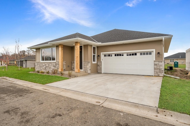 1242 Willowbrook Cir, Delano, MN 55328 - view of front of house with stone siding, driveway, a front lawn, a garage, and roof with shingles