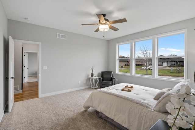 bedroom featuring carpet and ceiling fan