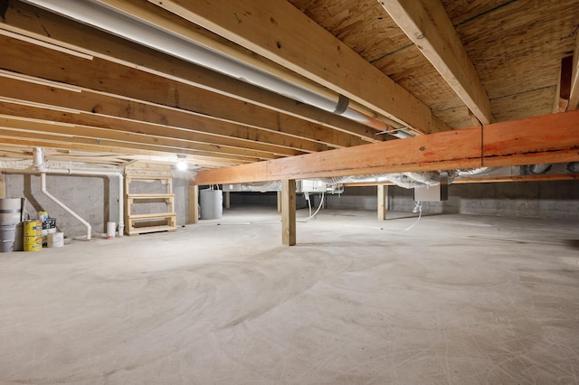 basement featuring water heater