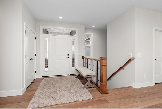 entryway with light wood-type flooring and a wealth of natural light