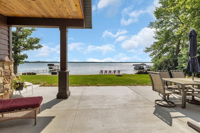 view of patio featuring a water view