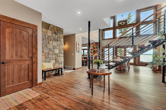 entrance foyer featuring wood-type flooring