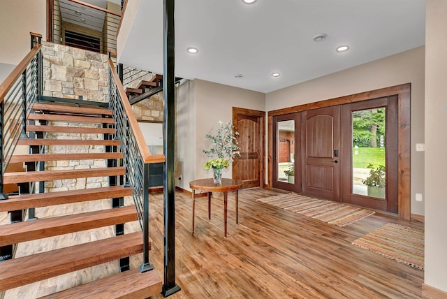 entryway with light hardwood / wood-style floors