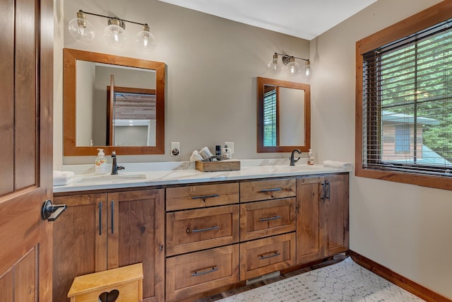 bathroom featuring tile patterned floors and vanity