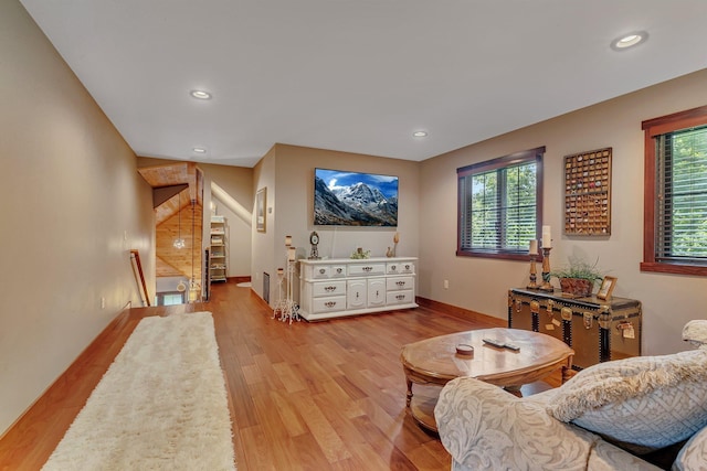 living room with light hardwood / wood-style floors