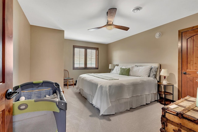 bedroom with ceiling fan and carpet