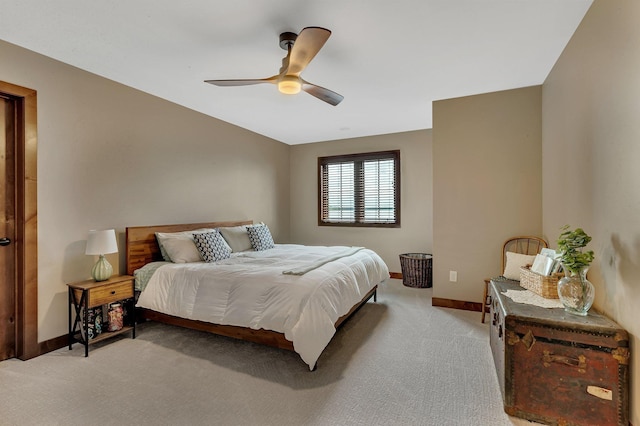 bedroom with light carpet and ceiling fan