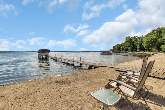 dock area with a water view