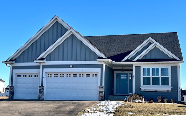 craftsman inspired home featuring a garage