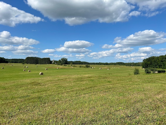 exterior space with a rural view