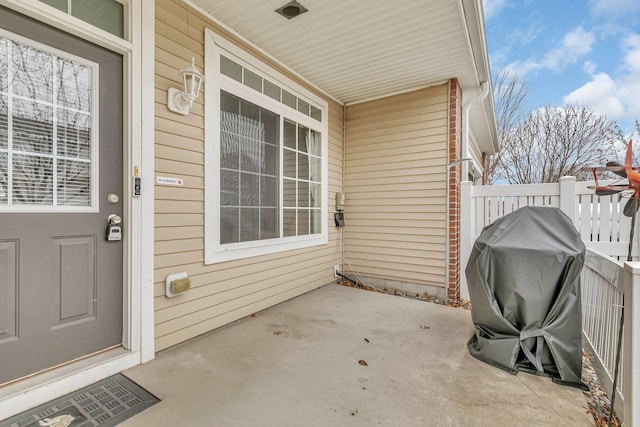 view of patio / terrace with grilling area and a porch