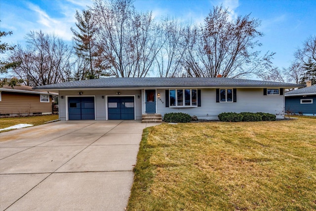 ranch-style house with a front yard and a garage