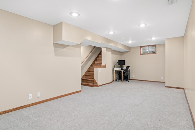 basement with light carpet