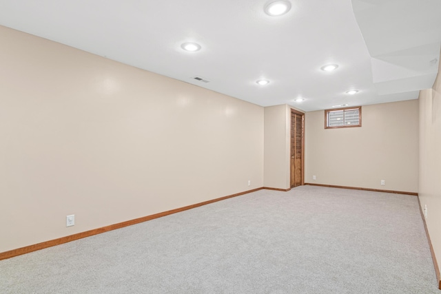 basement with light carpet