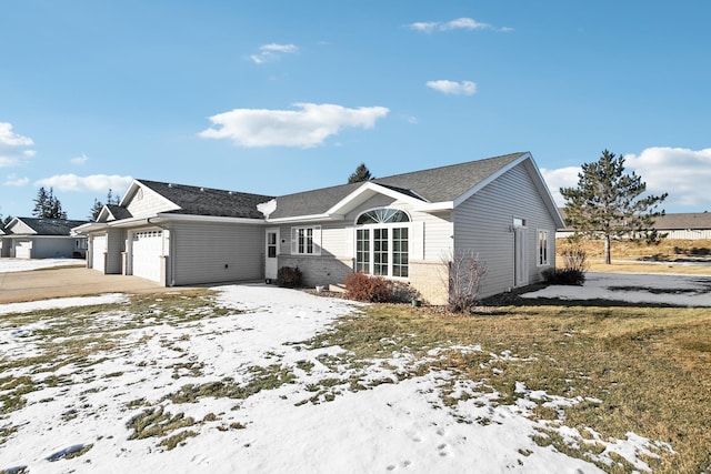 view of front of home featuring a garage