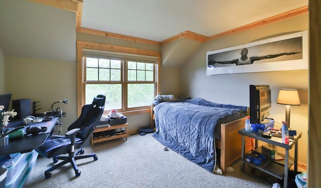 carpeted bedroom with vaulted ceiling