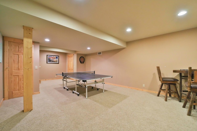 game room featuring light colored carpet