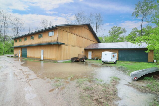 view of home's exterior with a garage