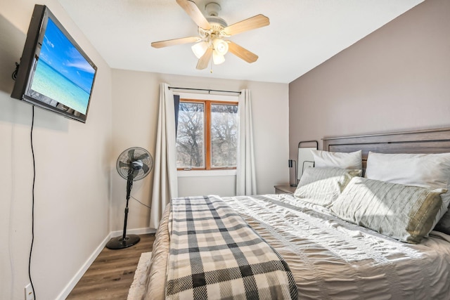 bedroom featuring ceiling fan and wood-type flooring