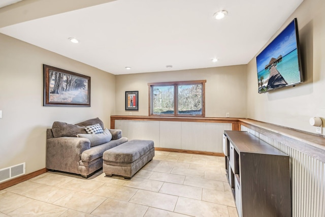 living room featuring light tile patterned floors