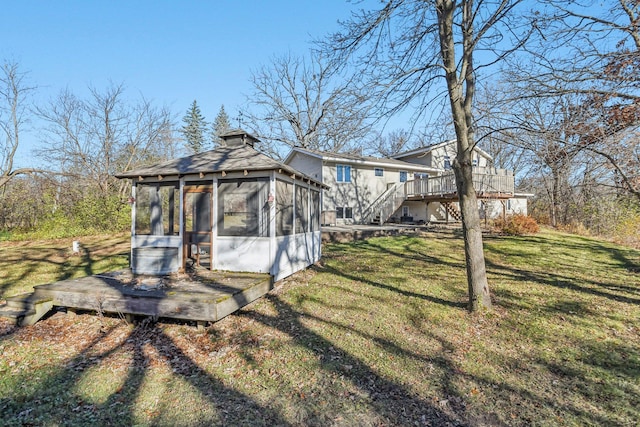 view of yard featuring a sunroom