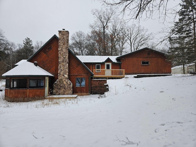 view of snow covered property