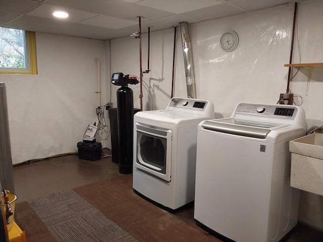 washroom featuring independent washer and dryer and sink