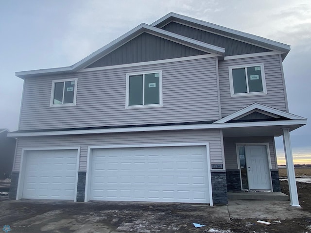 view of front of home with a garage