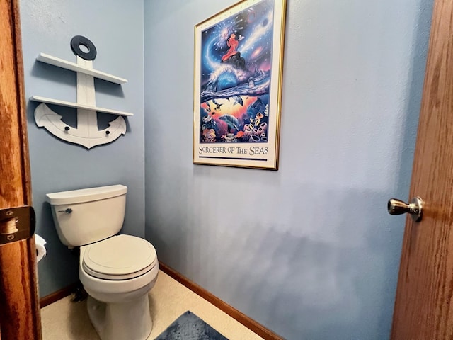 bathroom featuring toilet