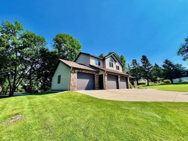 front of property with a front yard and a garage