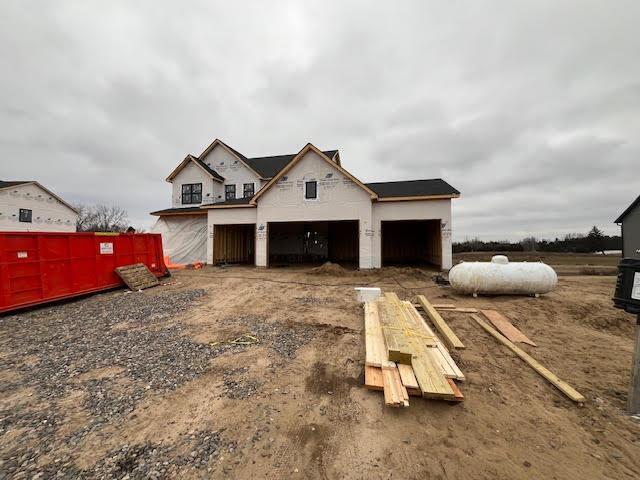 view of front of property featuring a garage