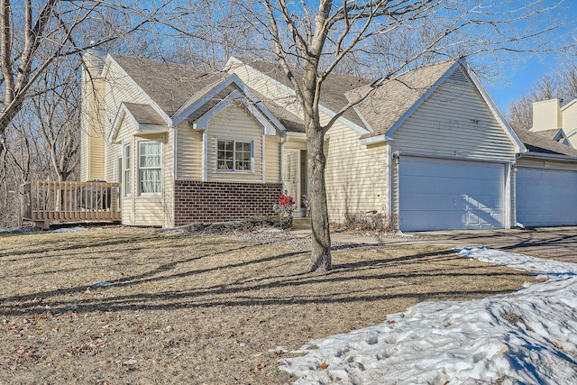 view of front of property with a garage