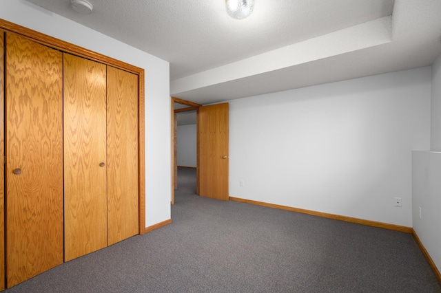 unfurnished bedroom with a closet and carpet