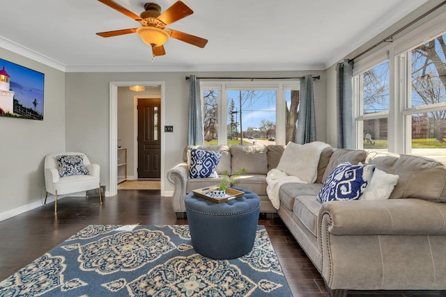 living room with dark hardwood / wood-style flooring, plenty of natural light, and ornamental molding