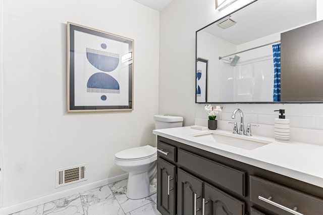 bathroom with vanity, toilet, and a shower with shower curtain