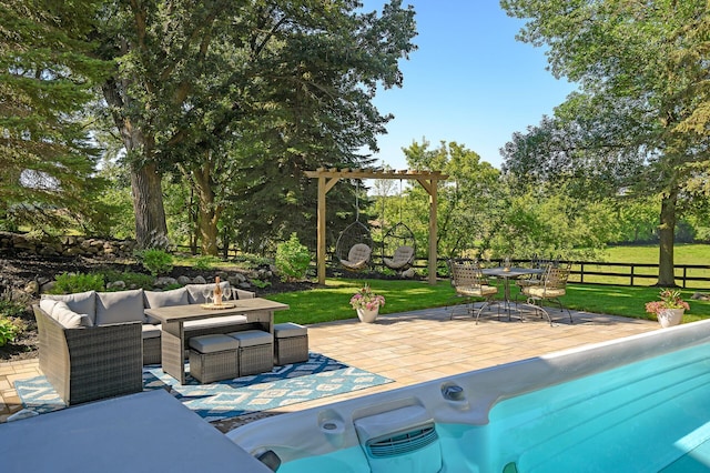 view of pool with outdoor lounge area, a patio, and a lawn