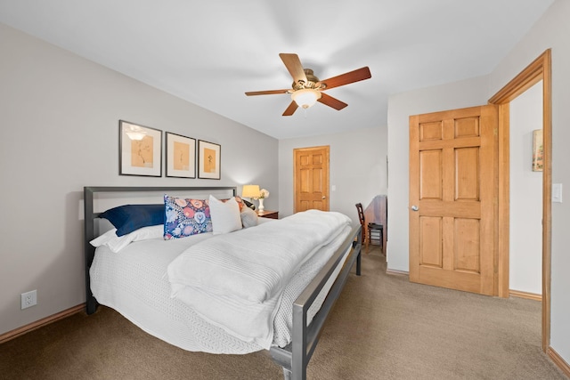 bedroom featuring ceiling fan and light carpet