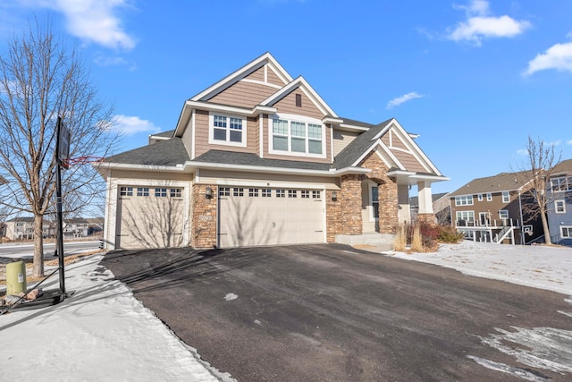 craftsman-style house featuring a garage