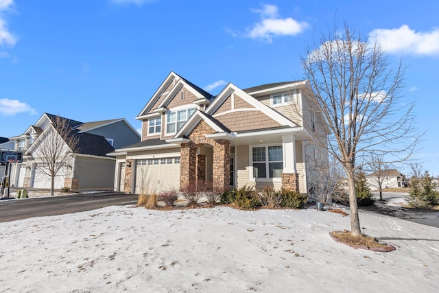 craftsman house with a garage