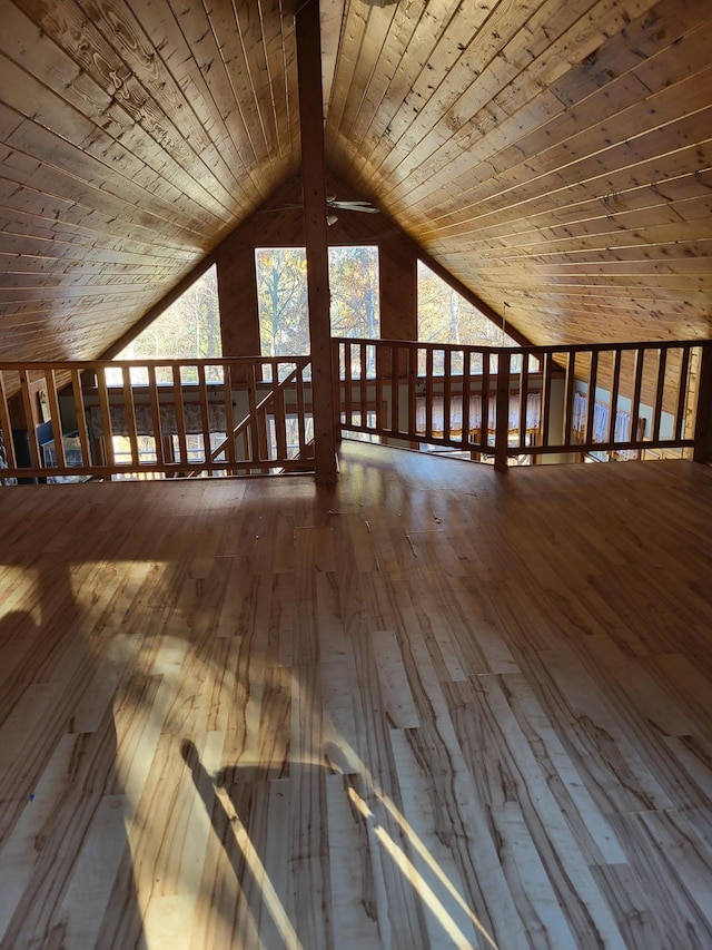 bonus room featuring hardwood / wood-style floors, lofted ceiling, ceiling fan, and wooden ceiling