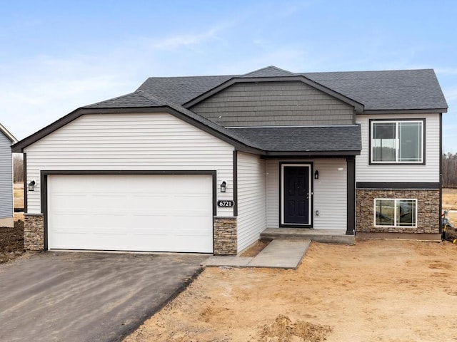 view of front of home with a garage