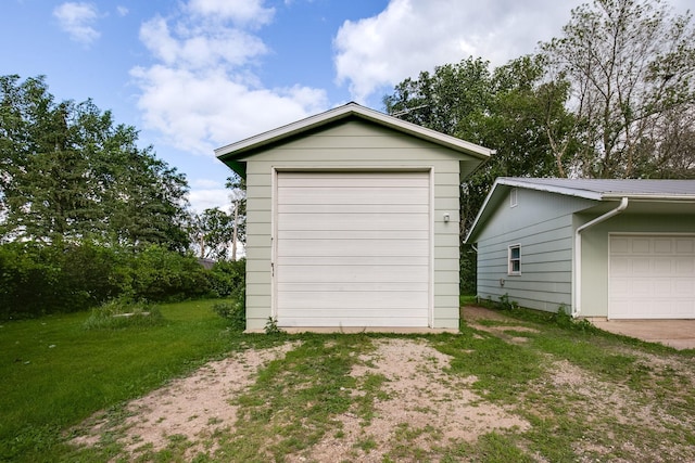 garage with a lawn