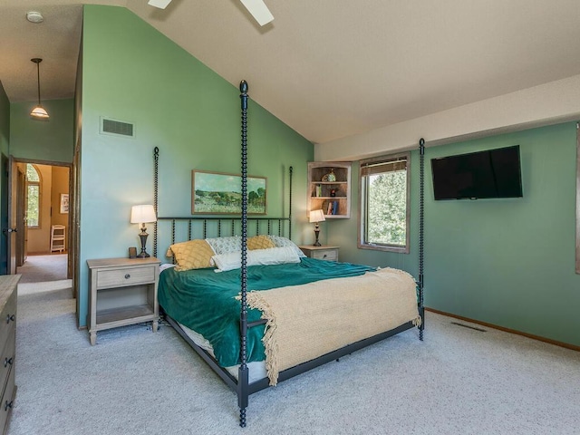 carpeted bedroom with high vaulted ceiling and ceiling fan