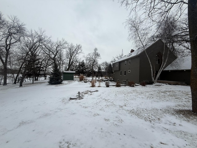 view of yard covered in snow