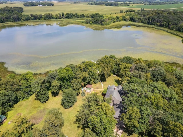 birds eye view of property with a water view and a rural view